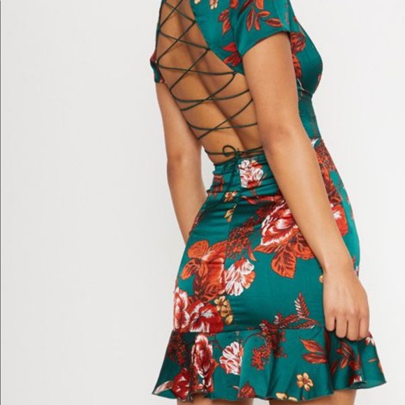 emerald green criss cross back frill hem shift dress